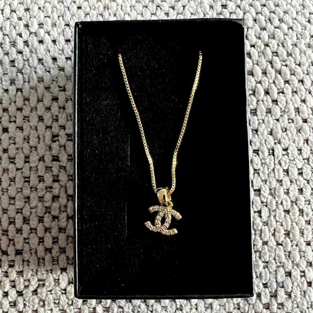 Gold cc style necklace
